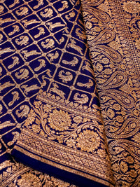 Handwoven violet Banarasi Crape Georgette Saree