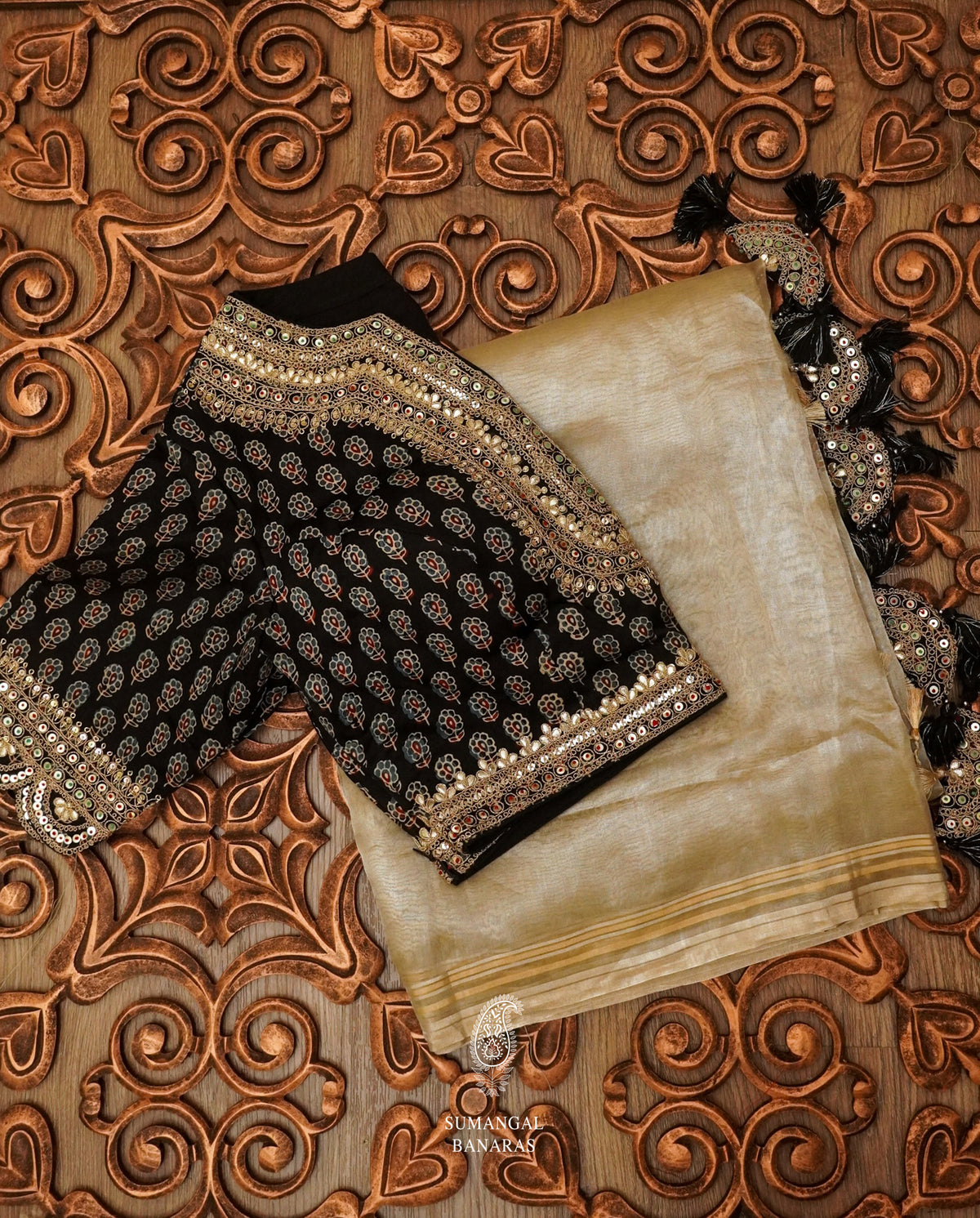 Gold Handloom Tissue Silk Saree With A Beautiful Black Gotta Patti Embroidered Blouse