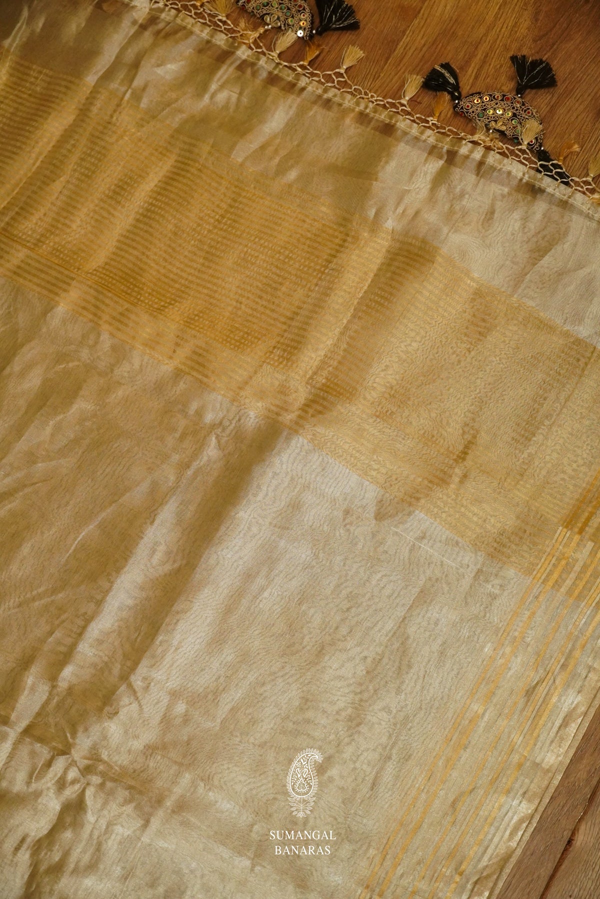 Gold Handloom Tissue Silk Saree With A Beautiful Black Gotta Patti Embroidered Blouse