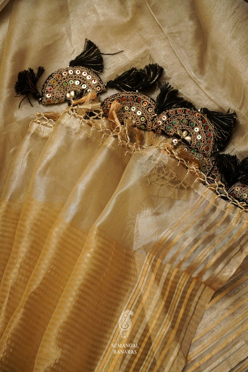 Gold Handloom Tissue Silk Saree With A Beautiful Black Gotta Patti Embroidered Blouse